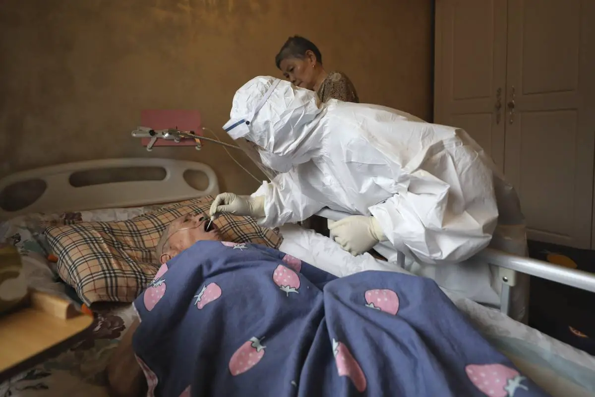 Un an après le premier décès lié à la couronne au monde, l'origine du virus reste inconnue 4 Un an après le premier décès lié à la couronne au monde, l'origine du virus reste inconnue - 3