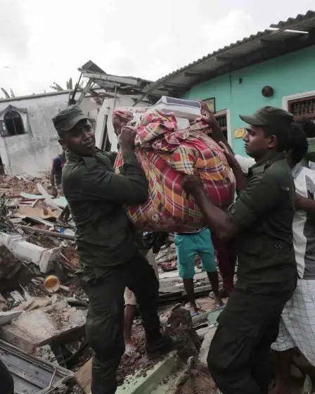 Au moins 16 morts dans le glissement de terrain d'ordures catastrophique au Sri Lanka 8 Au moins 16 morts dans le glissement de terrain d'ordures catastrophique au Sri Lanka - 7